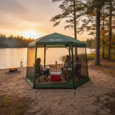 Clam Quick-Set Escape Gazebo Tent set up at a scenic campsite with people relaxing.