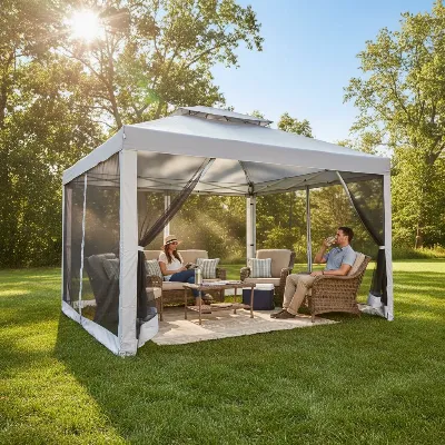 Coleman Backhome screened gazebo creating a comfortable outdoor living space with furniture